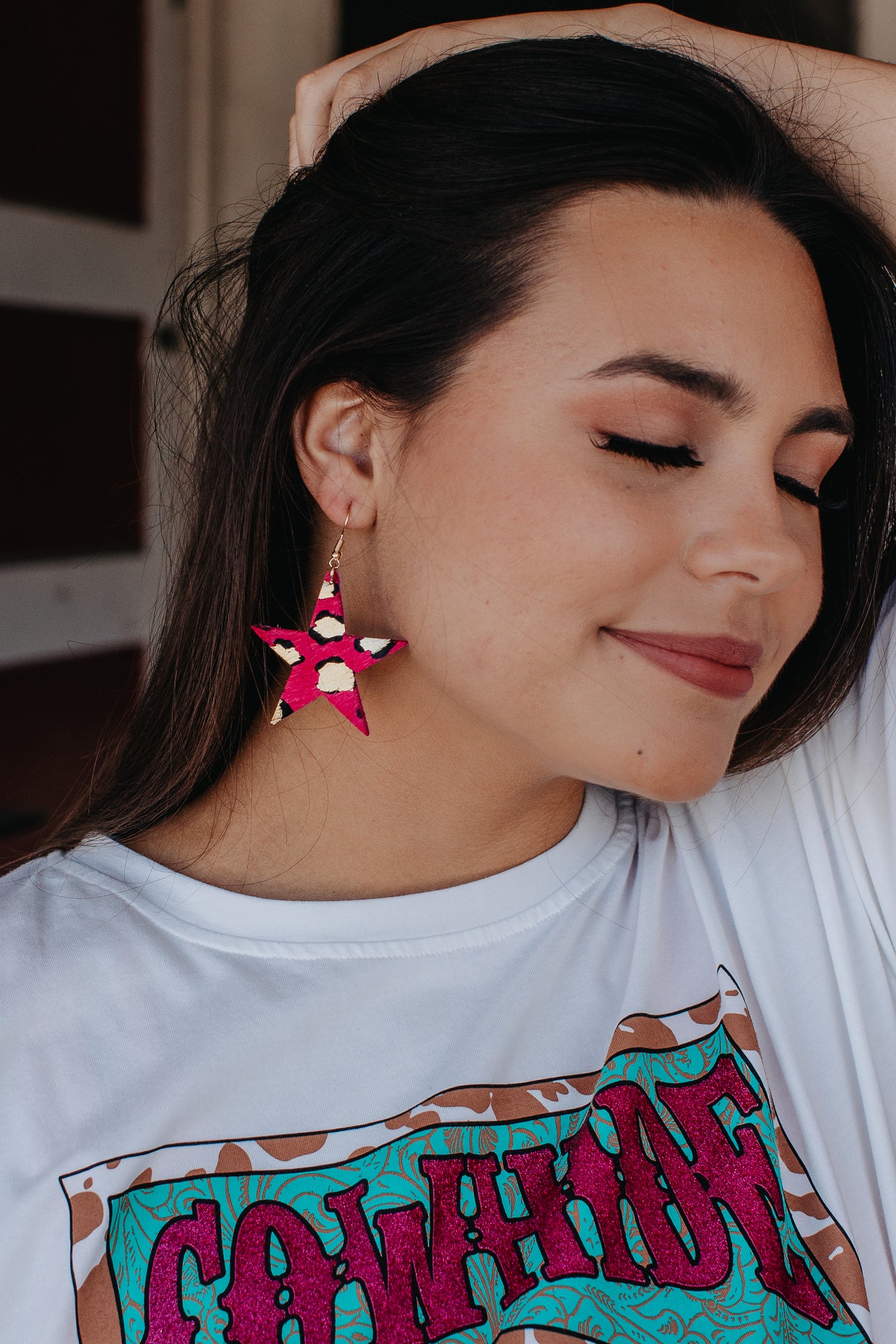 Shine bright, fuchsia star cowhide earring