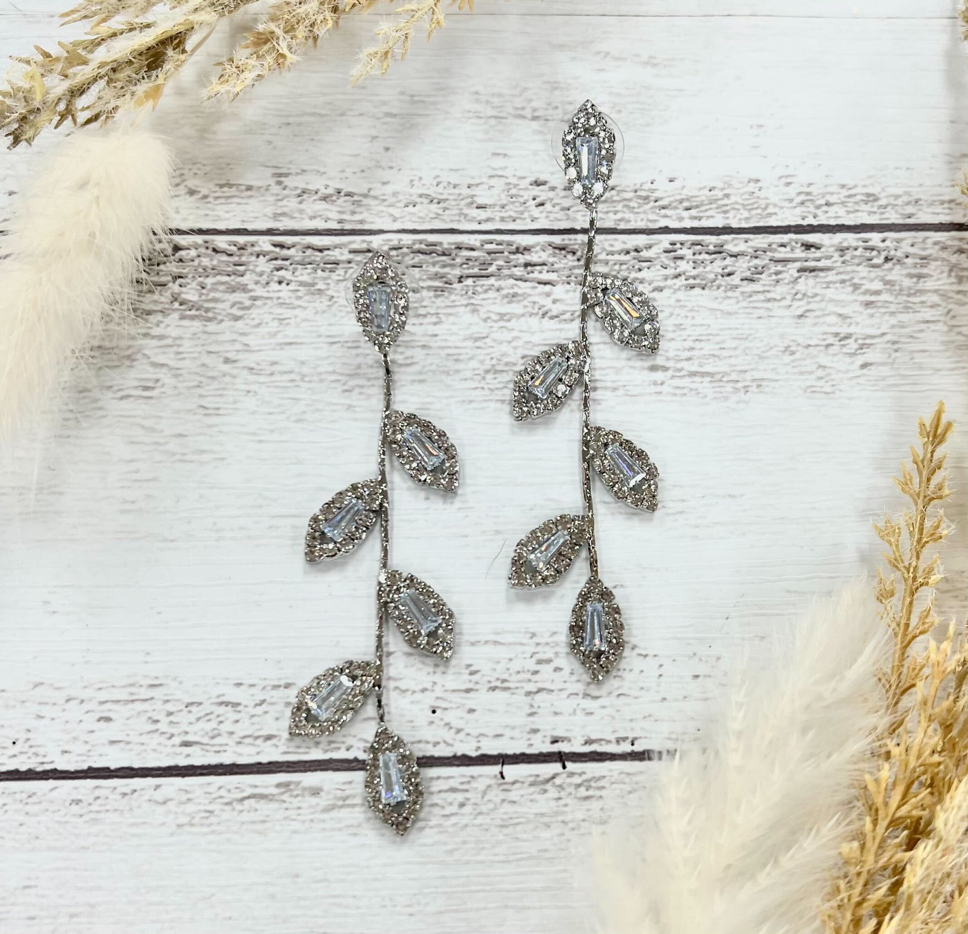 Love's Gilded Embrace: Silver Leaf Romance Earrings