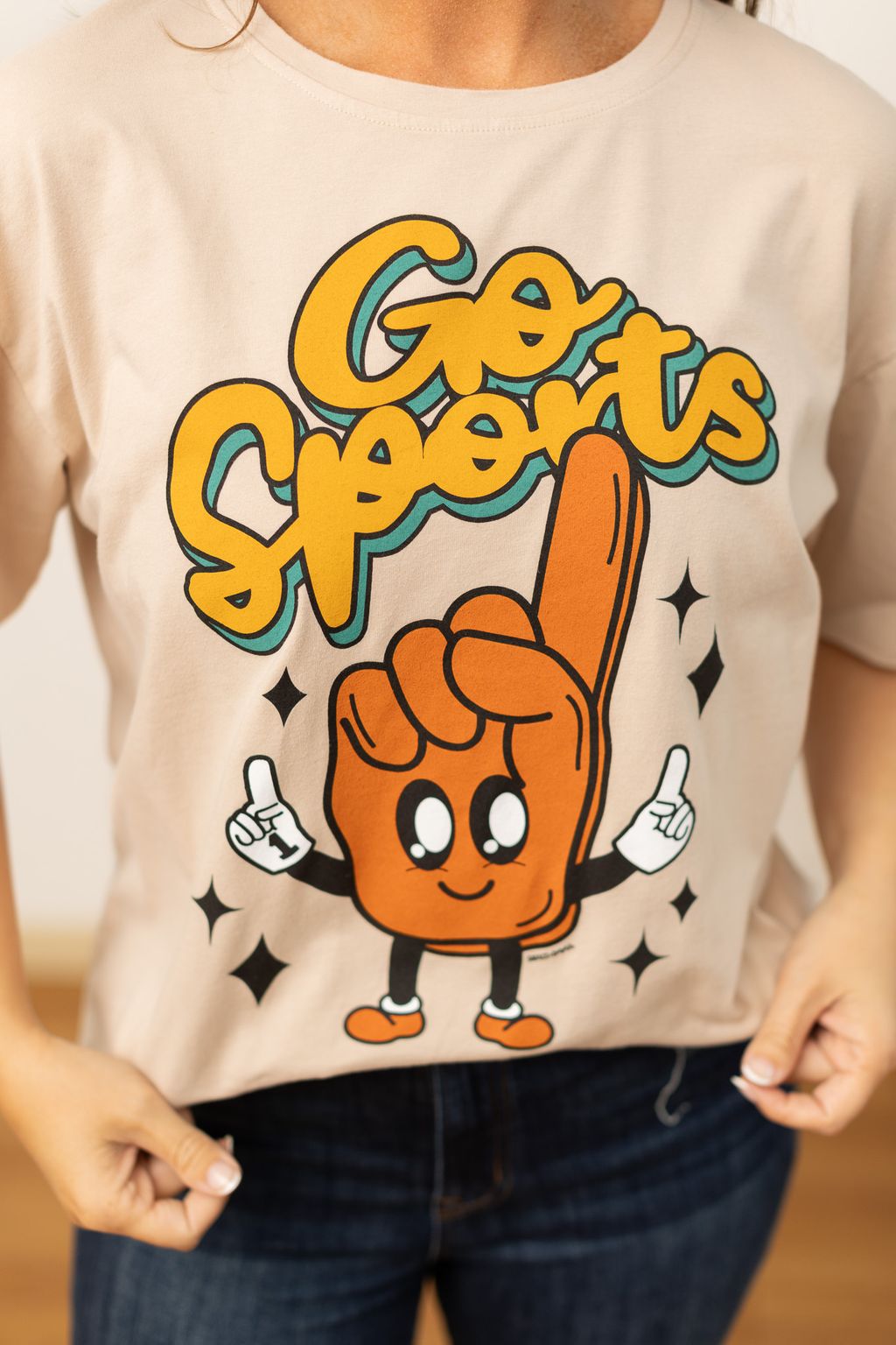 'Go Sports' on Beige Crewneck Tee