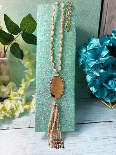 Simply Exquisite beige tassel beaded necklace